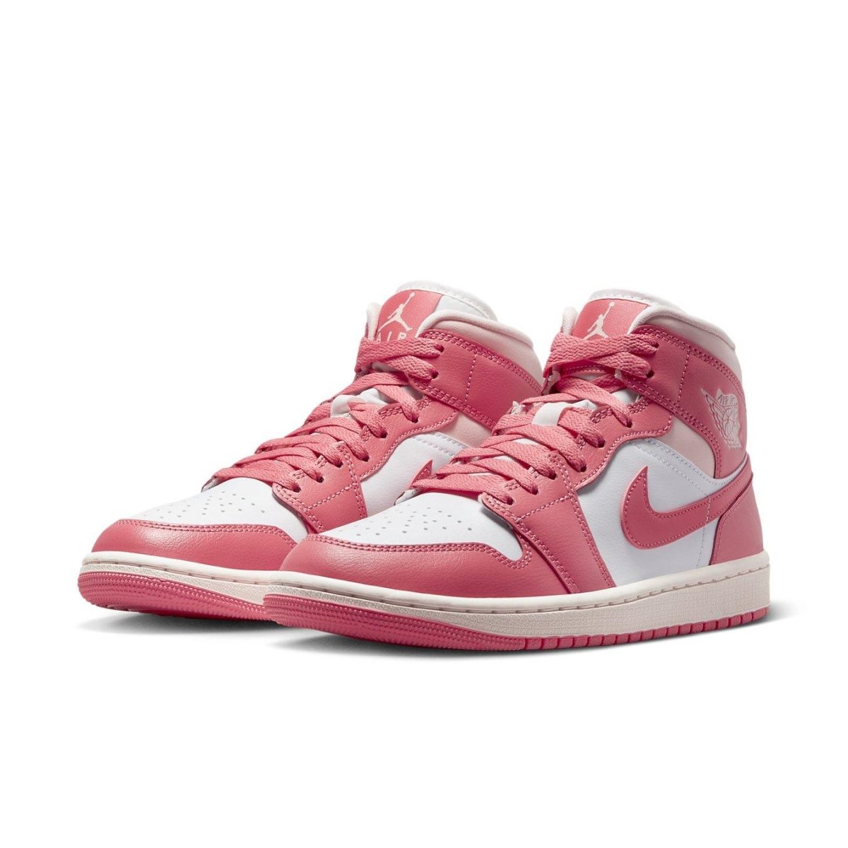 Nike Air Jordan 1 Mid Strawberries and Cream women's sneakers in pink and white colorway.