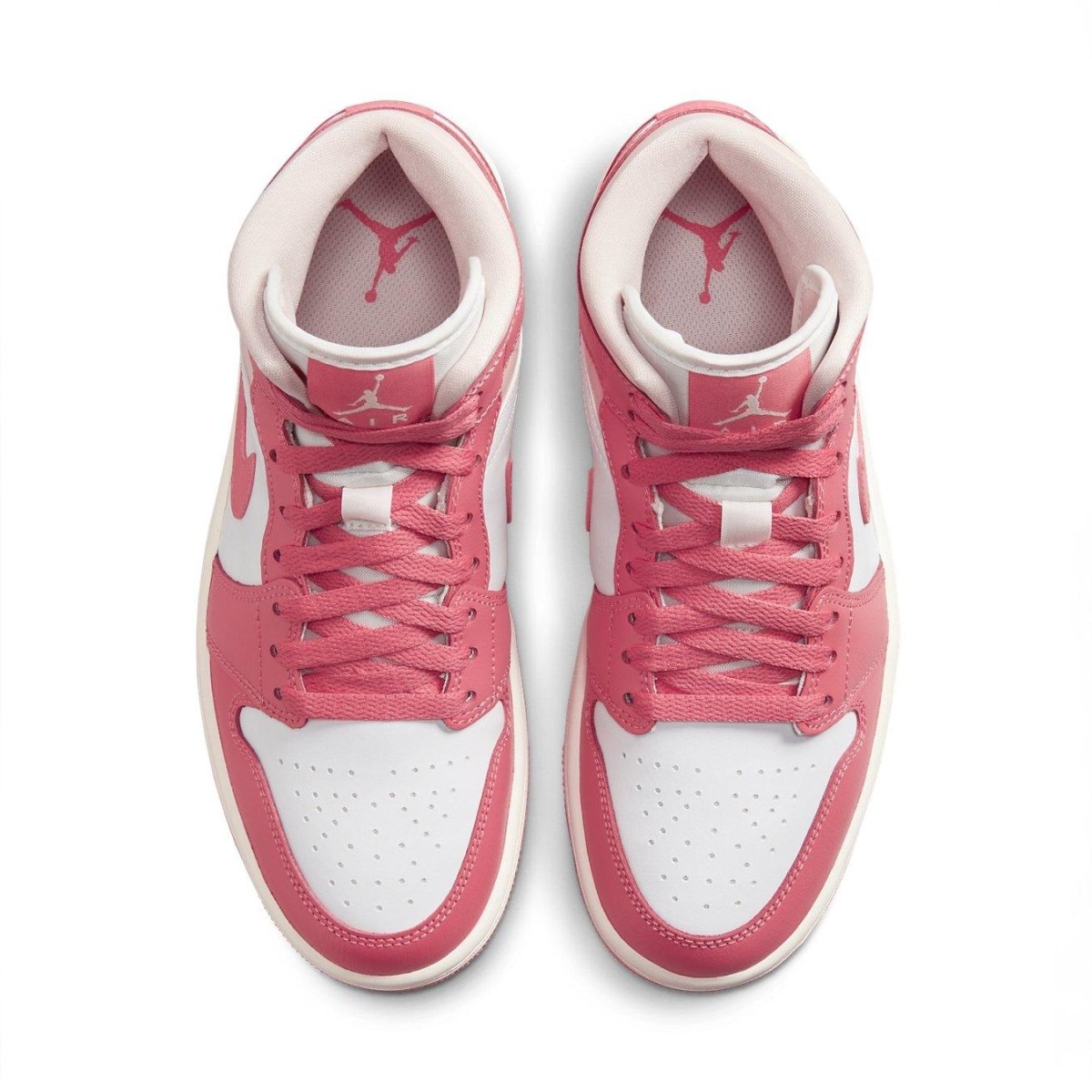 Jordan 1 Mid Strawberries and Cream for women, featuring pink and white leather upper with iconic branding.