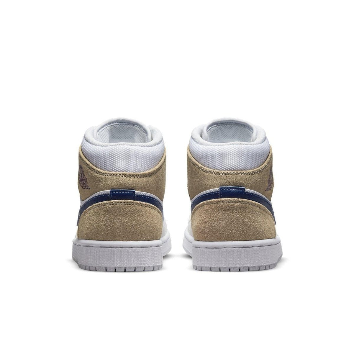 Back view of Jordan 1 Mid Tan Suede sneakers showcasing tan suede and dark blue accents on a white sole.