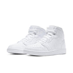 Jordan 1 Mid Triple White 2.0 (2020) sneakers in all-white leather with textured details.