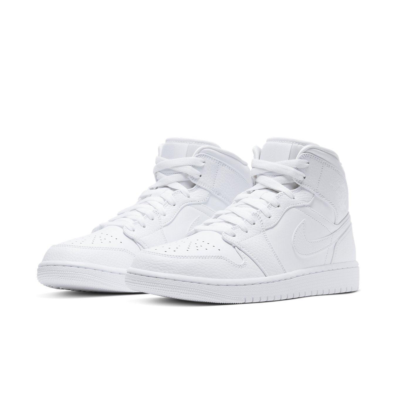 Jordan 1 Mid Triple White 2.0 (2020) sneakers in all-white leather with textured details.