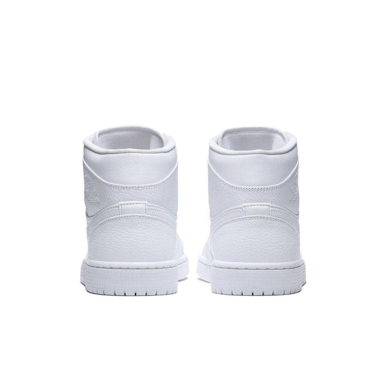 Air Jordan 1 Mid Triple White 2.0 (2020) - rear view showcasing sleek white leather design and textured panels.