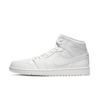 Jordan 1 Mid Triple White (2020) sneaker with a clean all-white design and iconic logo, emphasizing minimalism and style.