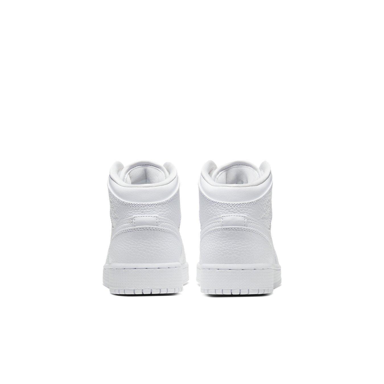 Jordan 1 Mid Triple White GS shoes back view featuring all-white leather design and textured details.
