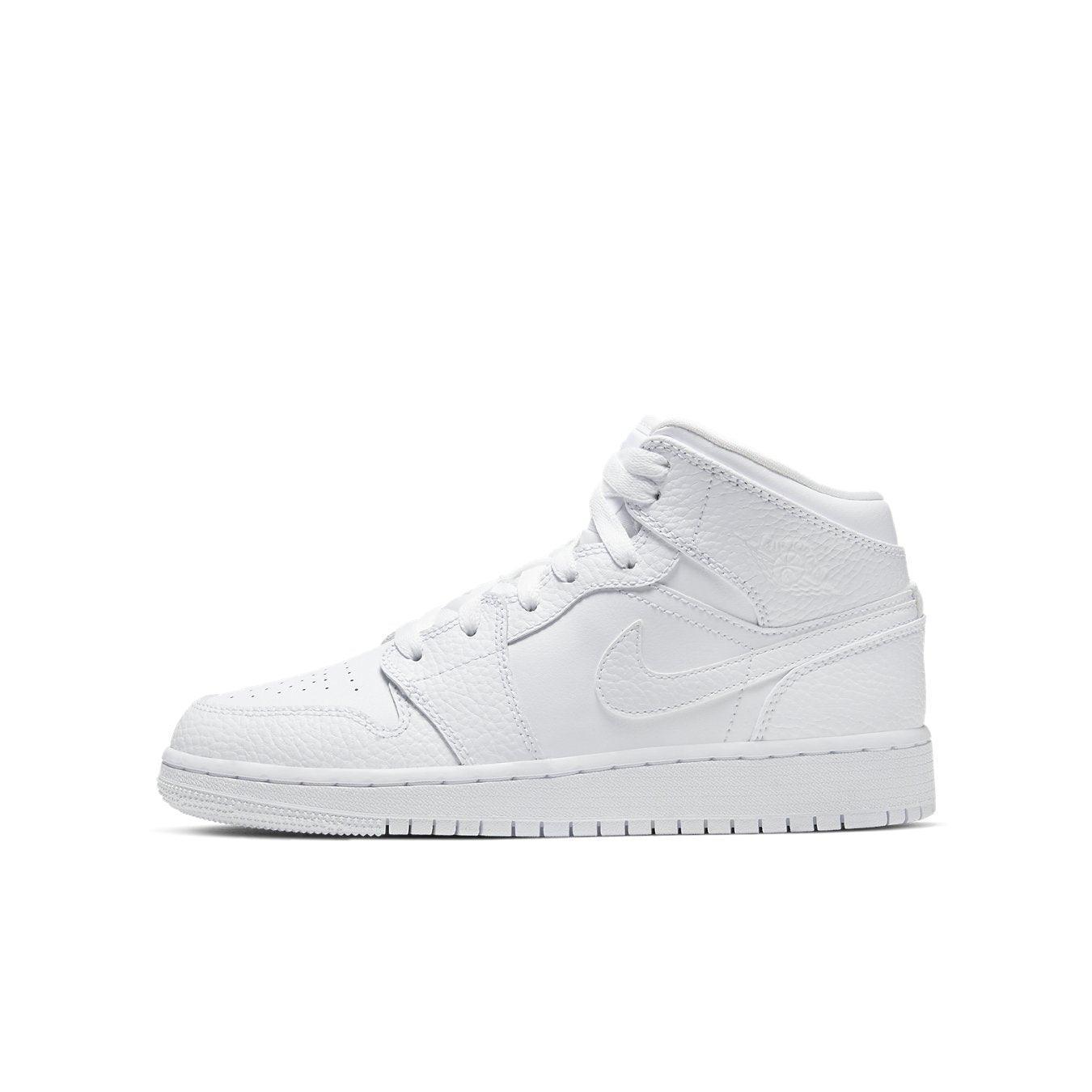 Air Jordan 1 Mid Triple White GS, stylish white sneakers for kids with leather upper and iconic design.