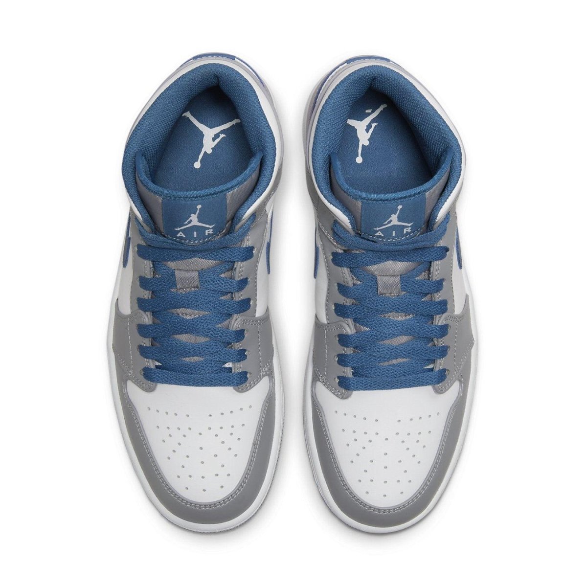 Air Jordan 1 Mid True Blue sneakers featuring white leather upper, True Blue accents, and classic design.