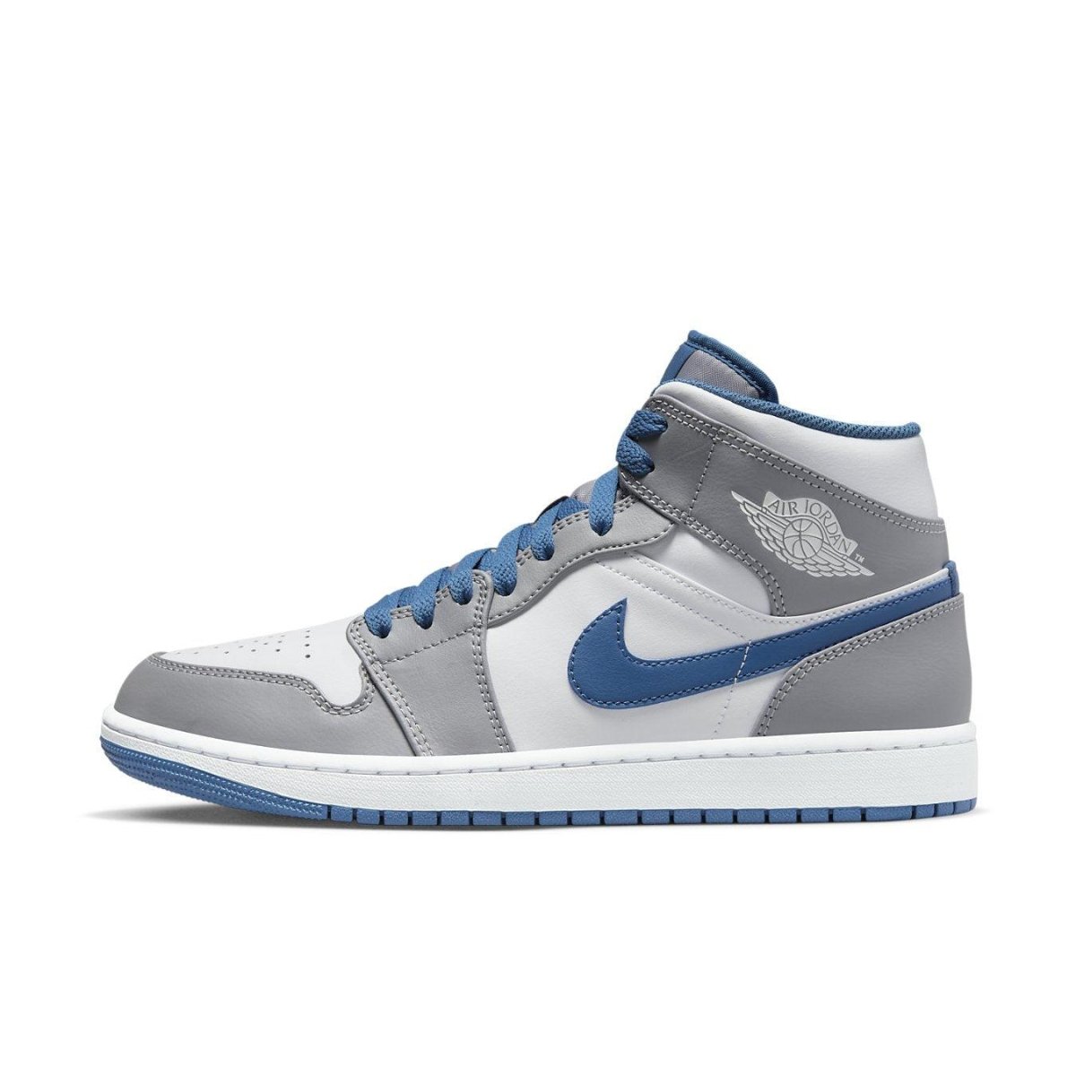 Air Jordan 1 Mid True Blue with white leather upper and blue accents on Swoosh and collar, model side view.
