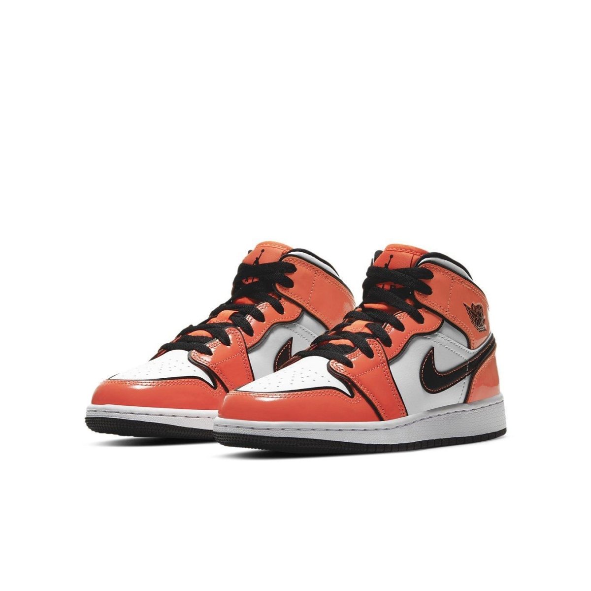 Jordan 1 Mid Turf Orange GS sneakers with vibrant orange and black accents, designed for youth fashion.