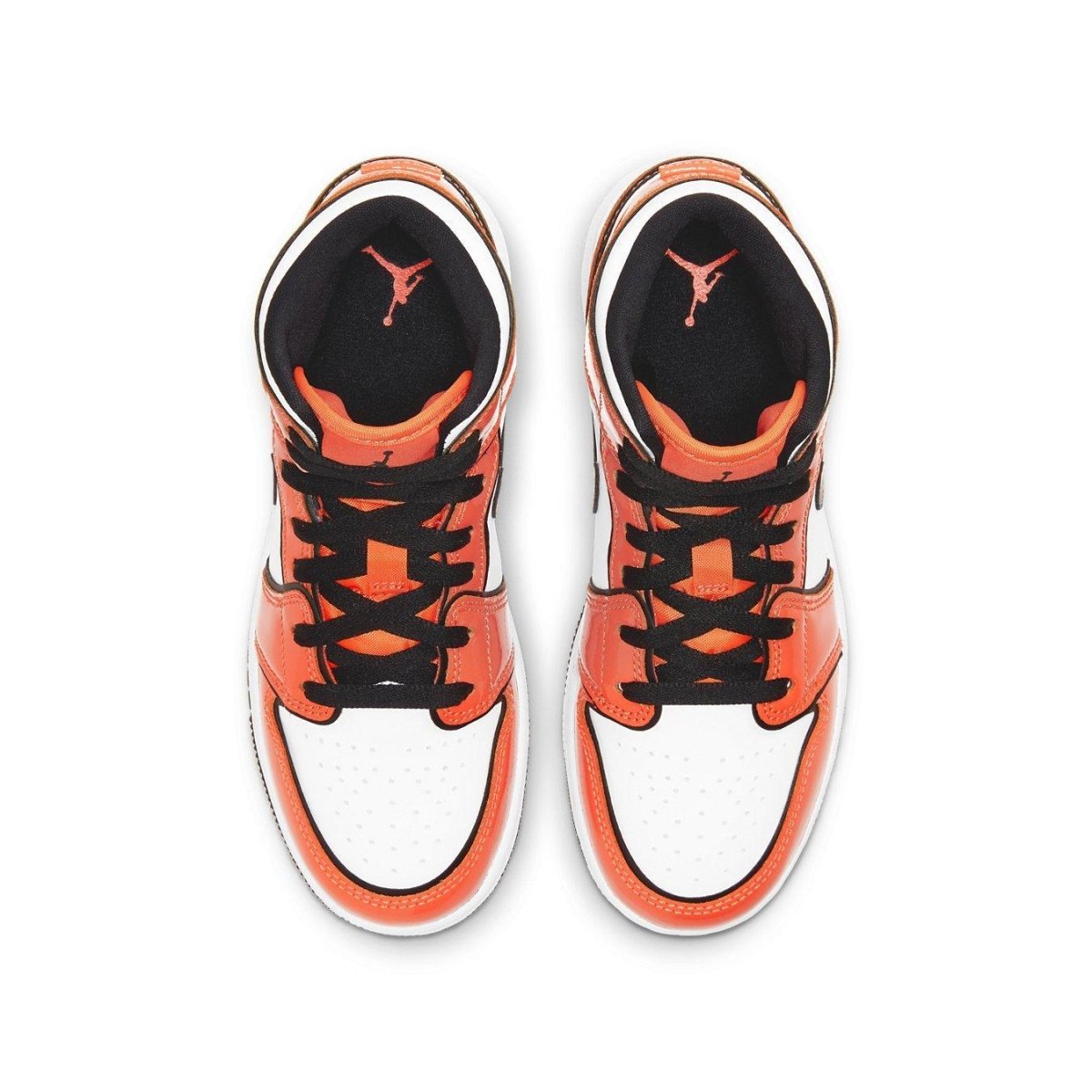 Air Jordan 1 Mid Turf Orange (GS) sneakers with bright orange and white colorway, top view.