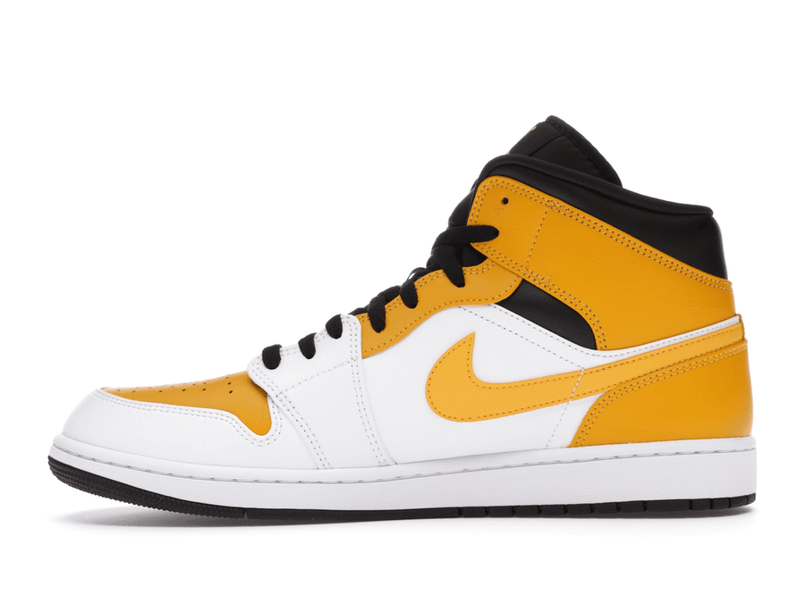 Nike Air Jordan 1 Mid University Gold sneakers in white, gold, and black colorway.