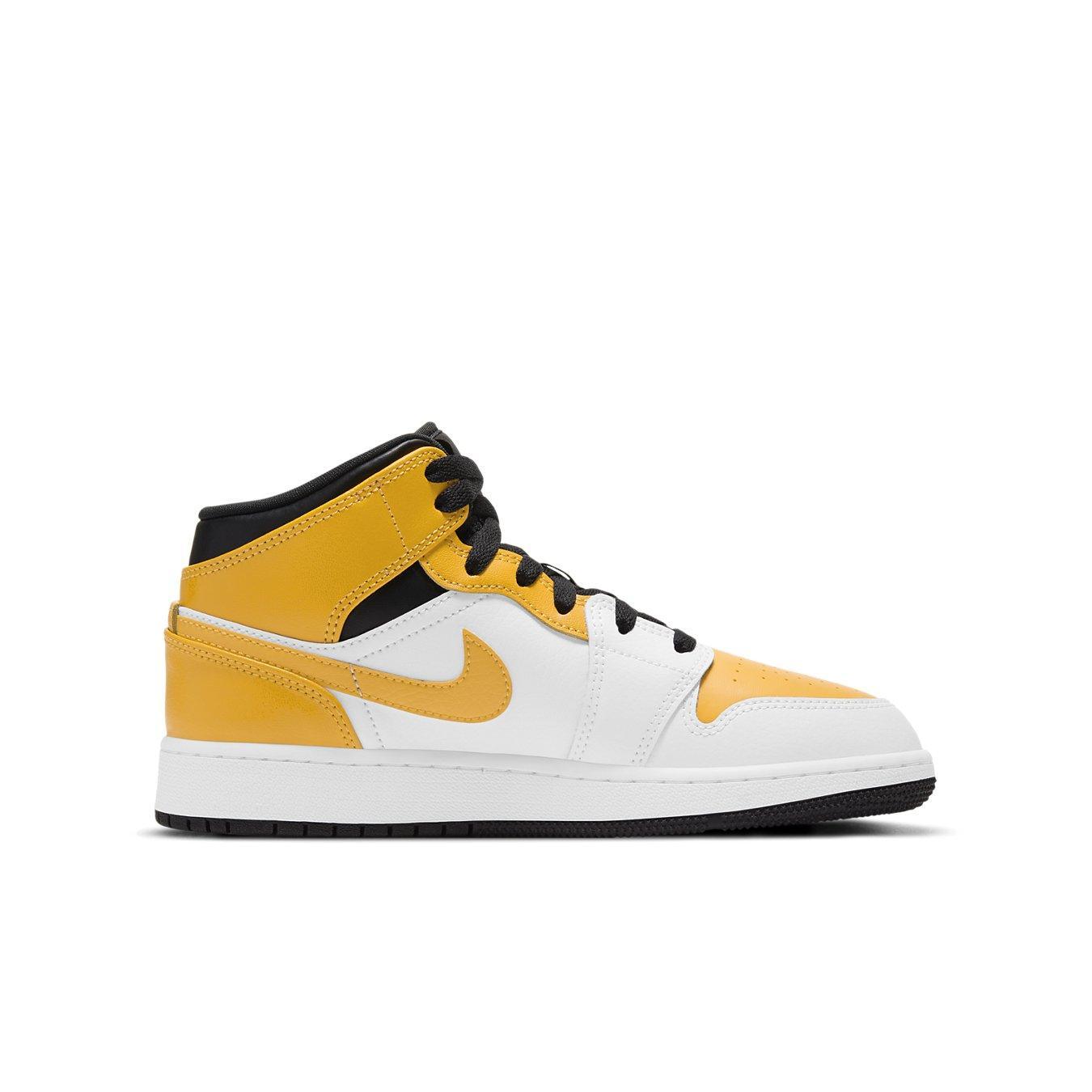Jordan 1 Mid University Gold (GS) sneaker featuring vibrant yellow, black, and white colorway.