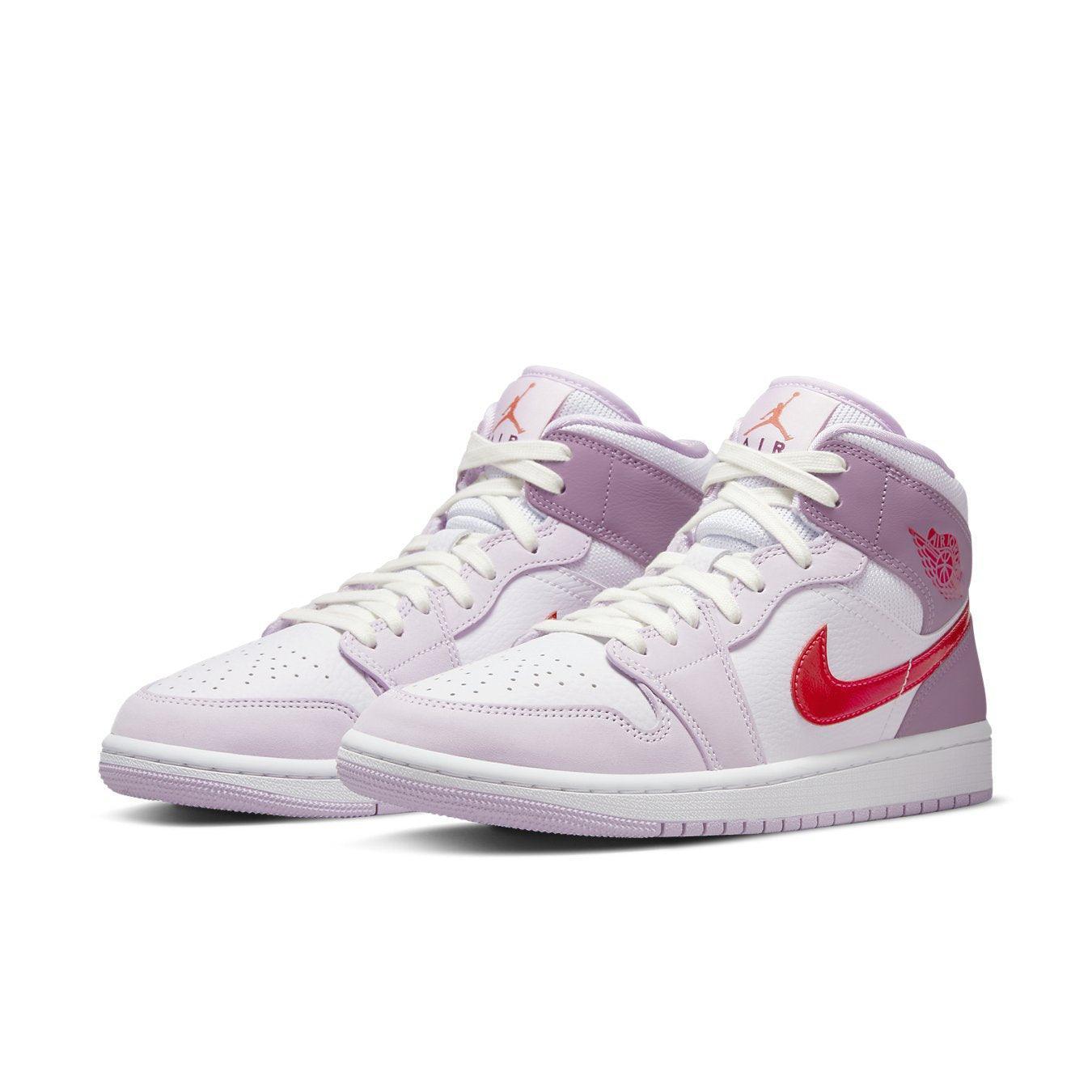 Jordan 1 Mid Valentine's Day (2022) women's sneakers with pink accents and floral details.