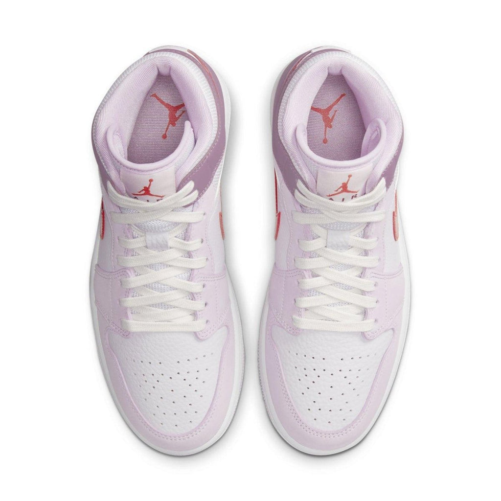 Jordan 1 Mid Valentine's Day 2022 women's sneakers featuring white leather and pink accents, Red Jumpman logo, and floral details.