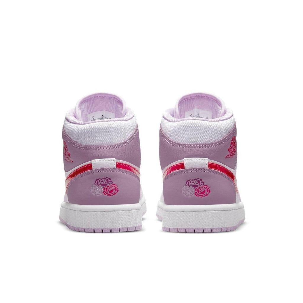Back view of Jordan 1 Mid Valentine's Day 2022, featuring pink leather and floral accents on the heel.