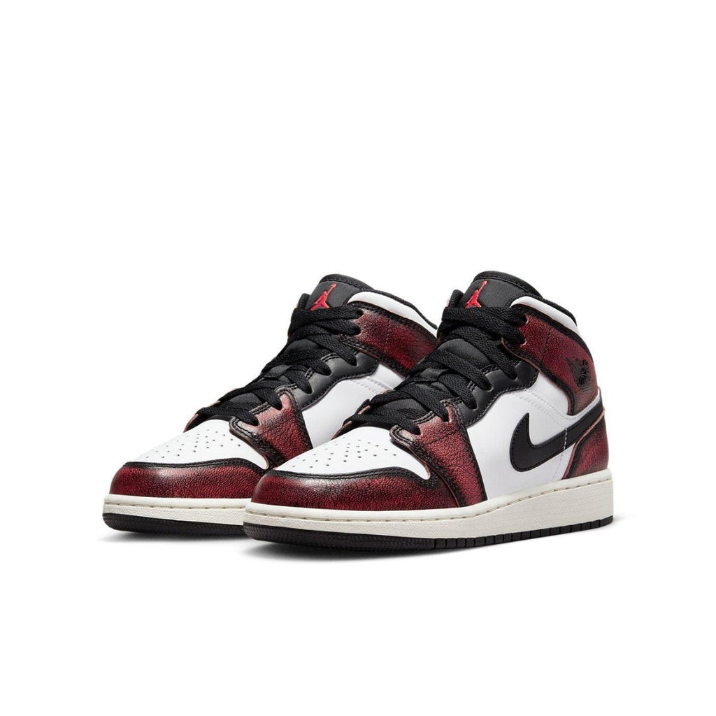 Jordan 1 Mid Wear-Away Chicago (GS) sneakers with black and red detailing, designed for older kids.