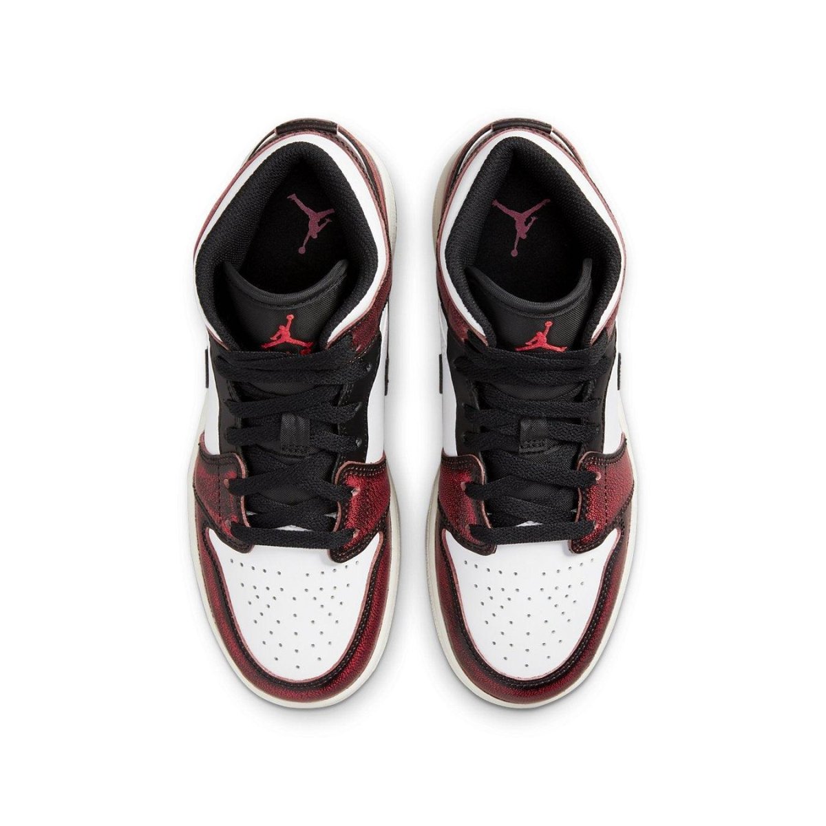 Top view of Jordan 1 Mid Wear-Away Chicago GS sneakers featuring black, white, and crimson colorway.