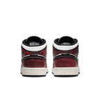 Rear view of the Air Jordan 1 Mid Wear-Away Chicago GS sneakers showcasing the red and black design.