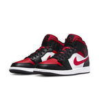 Jordan 1 Mid White Black Red (2022) featuring a unique design with oversized red tongue and preformed black sole.
