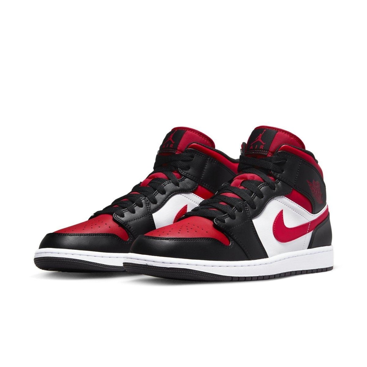 Jordan 1 Mid White Black Red (2022) featuring a unique design with oversized red tongue and preformed black sole.
