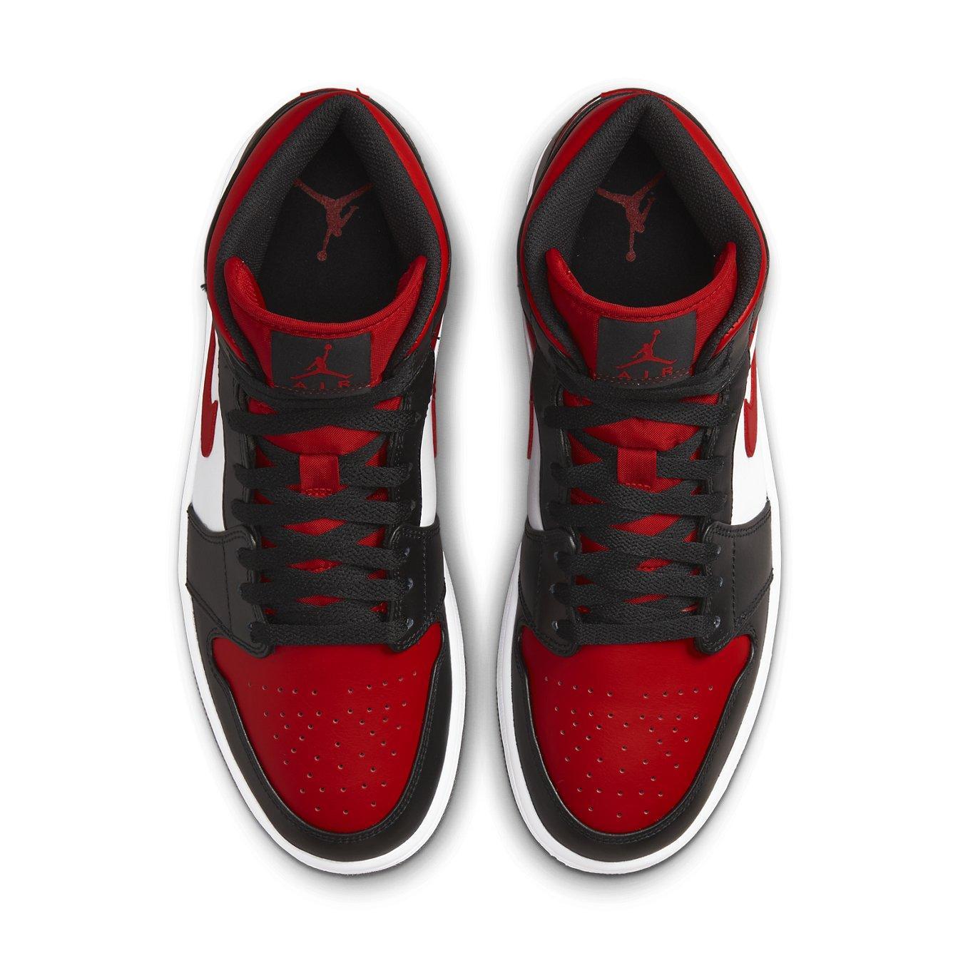 Jordan 1 Mid White Black Red 2022, featuring oversized tongue and unique color details, top view.