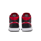 Jordan 1 Mid White Black Red 2022 sneakers rear view with oversized red tongue and black accents.