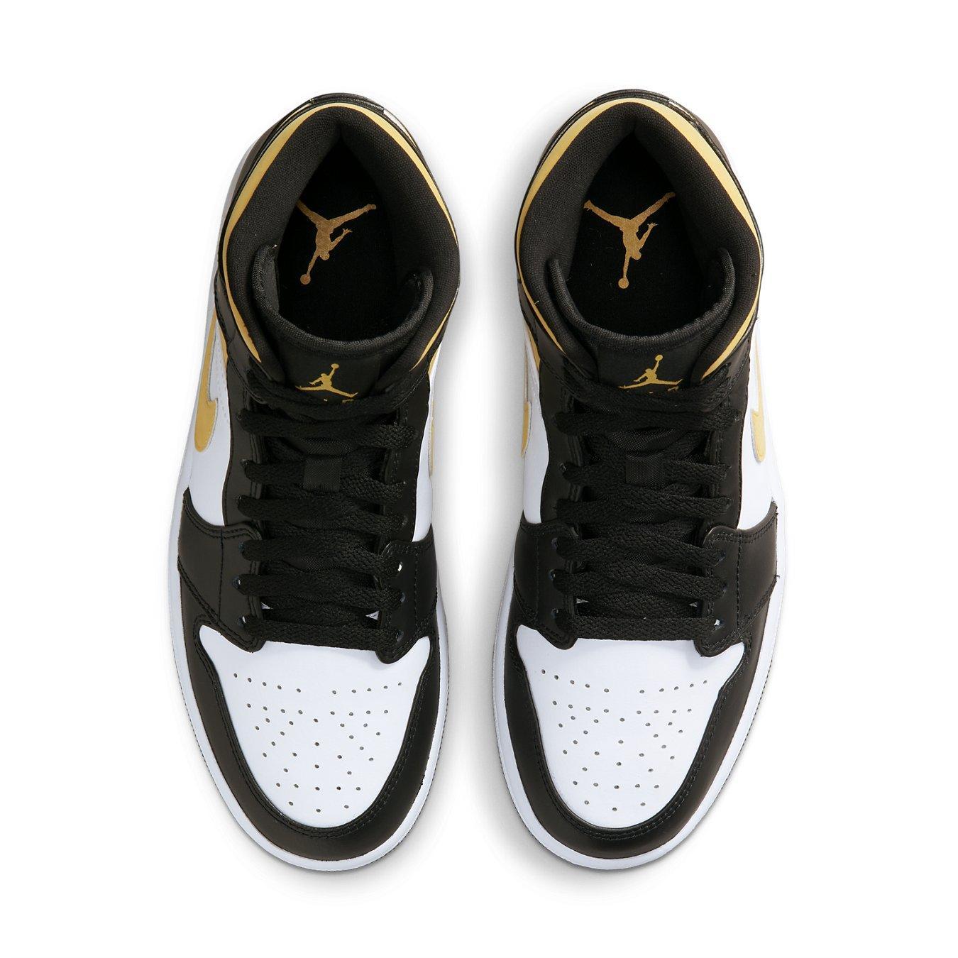 Top view of Jordan 1 Mid White Pollen Black sneakers featuring black and gold accents.