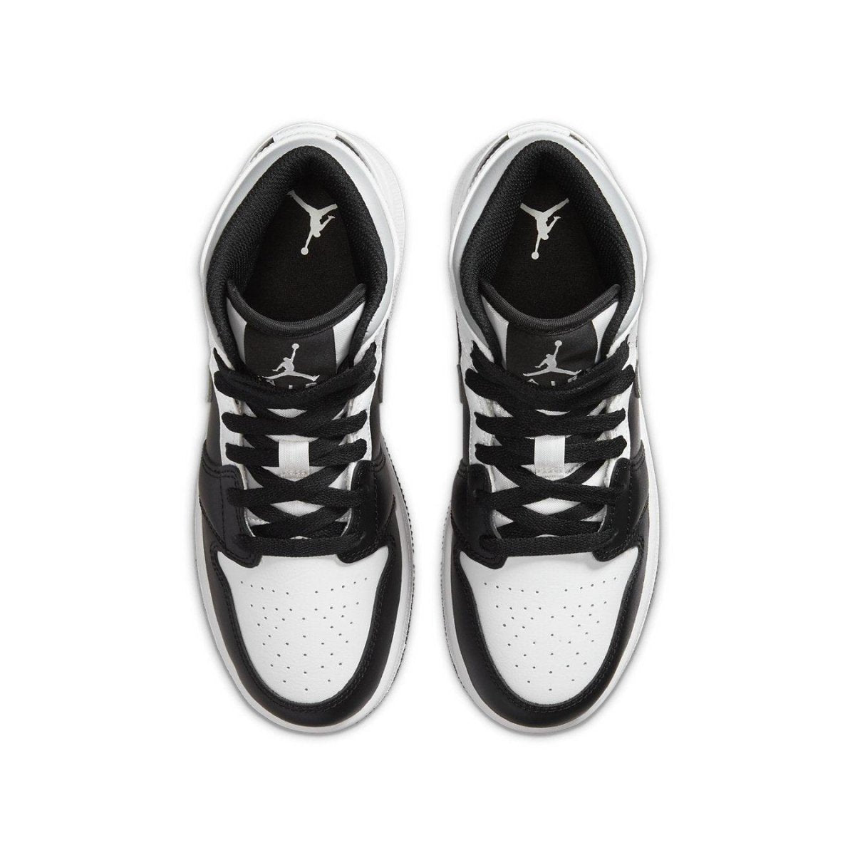 Top view of Jordan 1 Mid White Shadow GS sneakers in black and white with iconic Jordan logo.