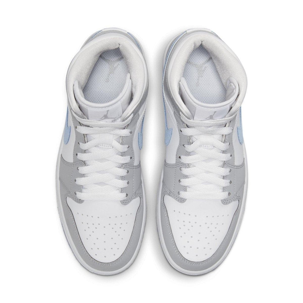 Jordan 1 Mid Wolf Grey Aluminum women's sneakers featuring grey suede, blue Swoosh, and icy soles.
