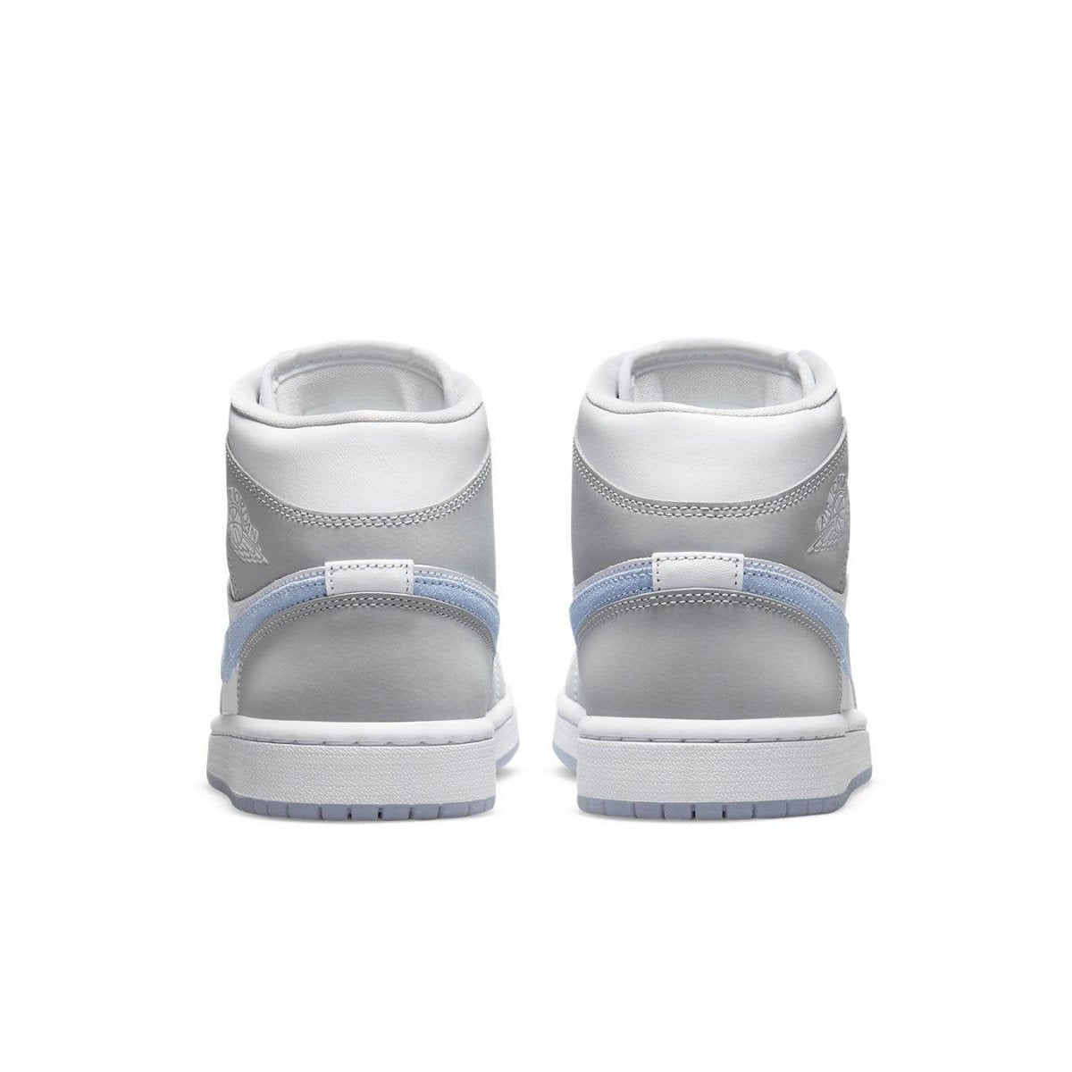 Jordan 1 Mid Wolf Grey Aluminum women's sneakers with grey suede and icy blue accents, viewed from the back.