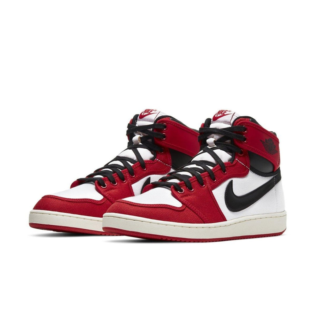 Nike Air Jordan 1 Retro AJKO Chicago 2021 sneakers in white, red, and black color scheme.