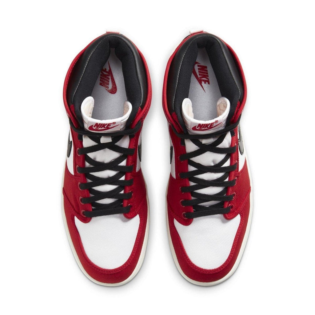 Top view of Air Jordan 1 Retro AJKO Chicago 2021 sneakers featuring red and white canvas design.
