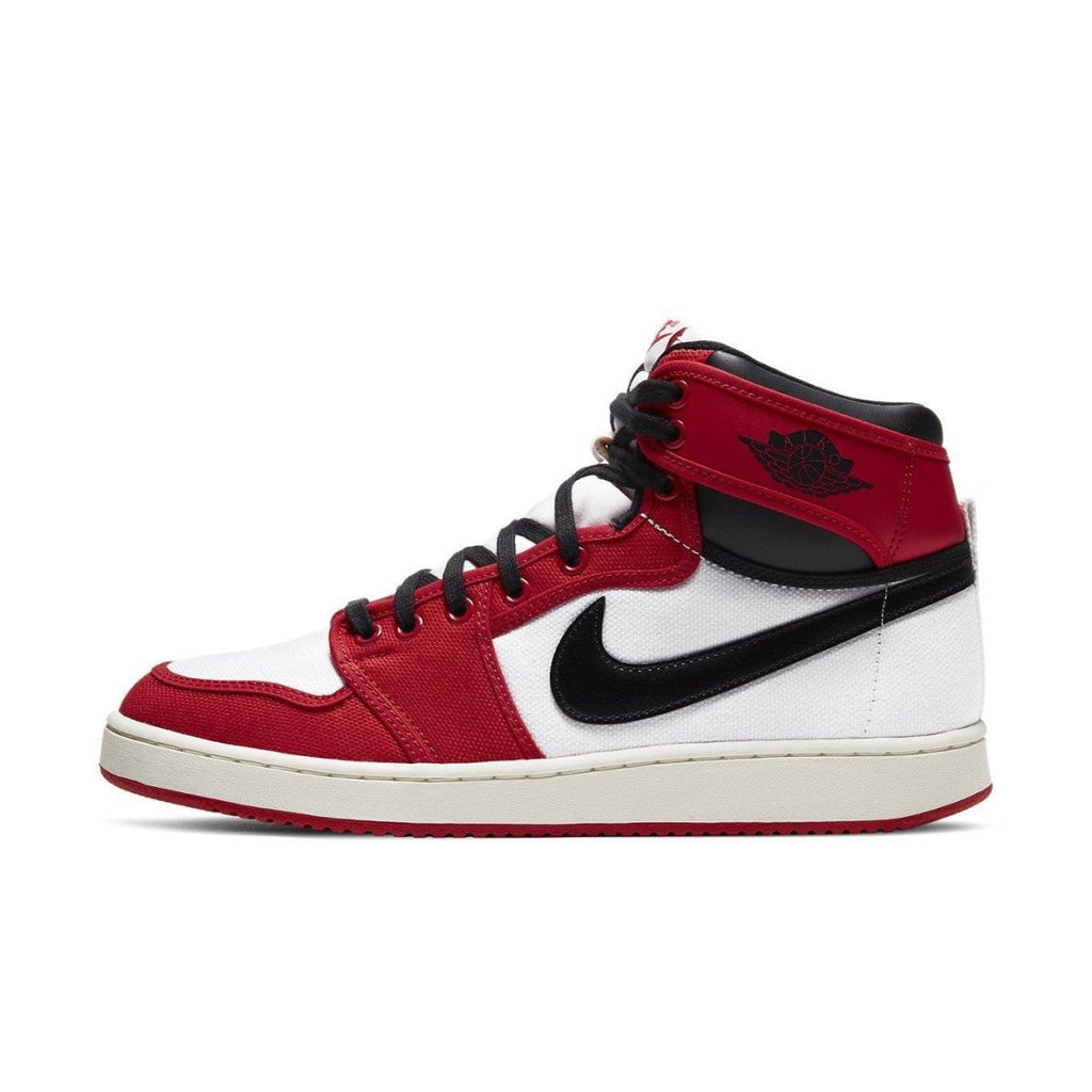 Jordan 1 Retro AJKO Chicago 2021 sneaker featuring red and white colorway with black Swoosh.