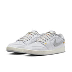 Air Jordan 1 Retro AJKO Low SP Union in White and Neutral Grey, featuring cotton twill detailing and signature Swoosh.