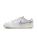 Air Jordan 1 Retro AJKO Low SP Union in white and neutral grey, featuring a cotton twill finish and classic silhouette.