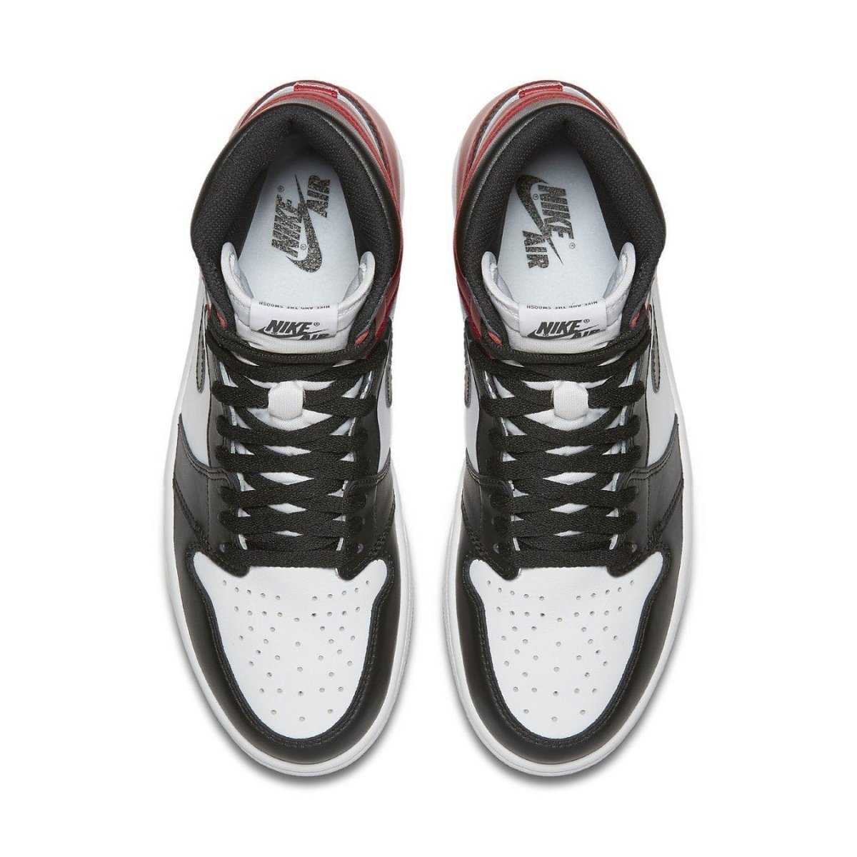 Top view of Jordan 1 Retro Black Toe sneakers with black and white leather, red accents, and signature Nike branding.