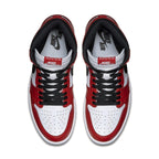 Top view of the Nike Air Jordan 1 Retro Chicago 2015 sneakers in red, white, and black colorway.