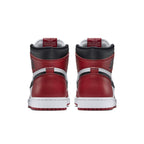 Back view of Air Jordan 1 Retro Chicago 2015 sneakers highlighting red, white, and black colorway.