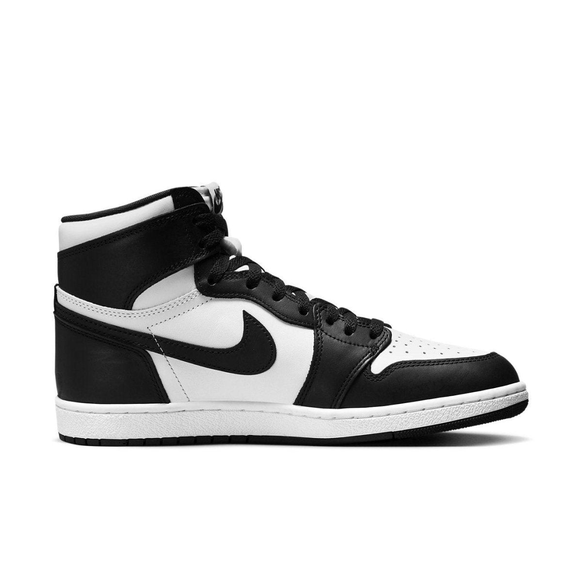 Jordan 1 Retro High 85 Black White sneakers, featuring smooth black and white leather design.