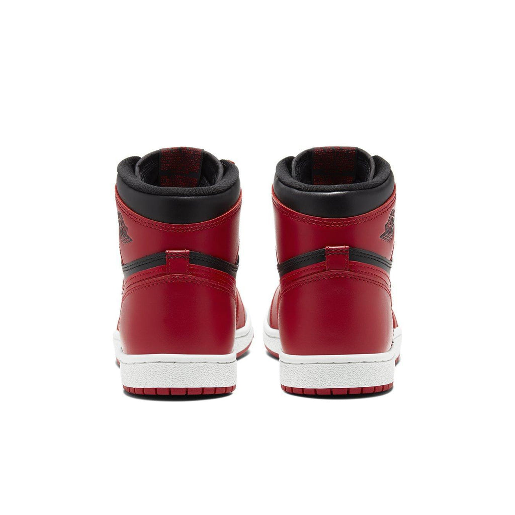 Retro Air Jordan 1 High 85 Varsity Red shoes, showcasing the back view and classic red and black colorway.