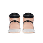 Back view of Air Jordan 1 Retro High Black Crimson Tint showcasing pink and black leather design.