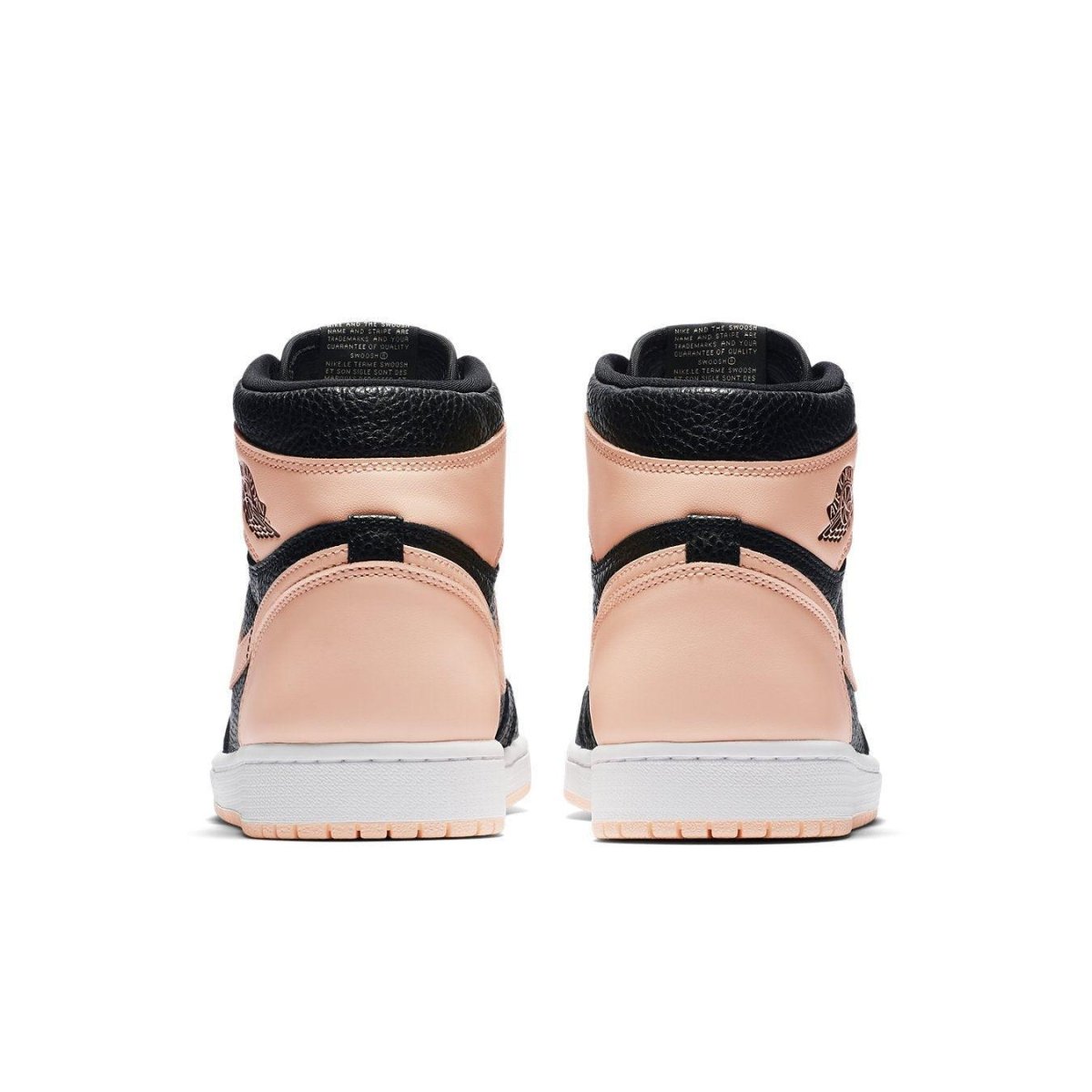 Back view of Air Jordan 1 Retro High Black Crimson Tint showcasing pink and black leather design.