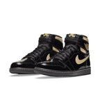 Jordan 1 Retro High Black Metallic Gold sneakers with glossy black and gold accents.