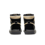 Back view of Jordan 1 Retro High Black Metallic Gold shoes showcasing patent leather and gold accents.