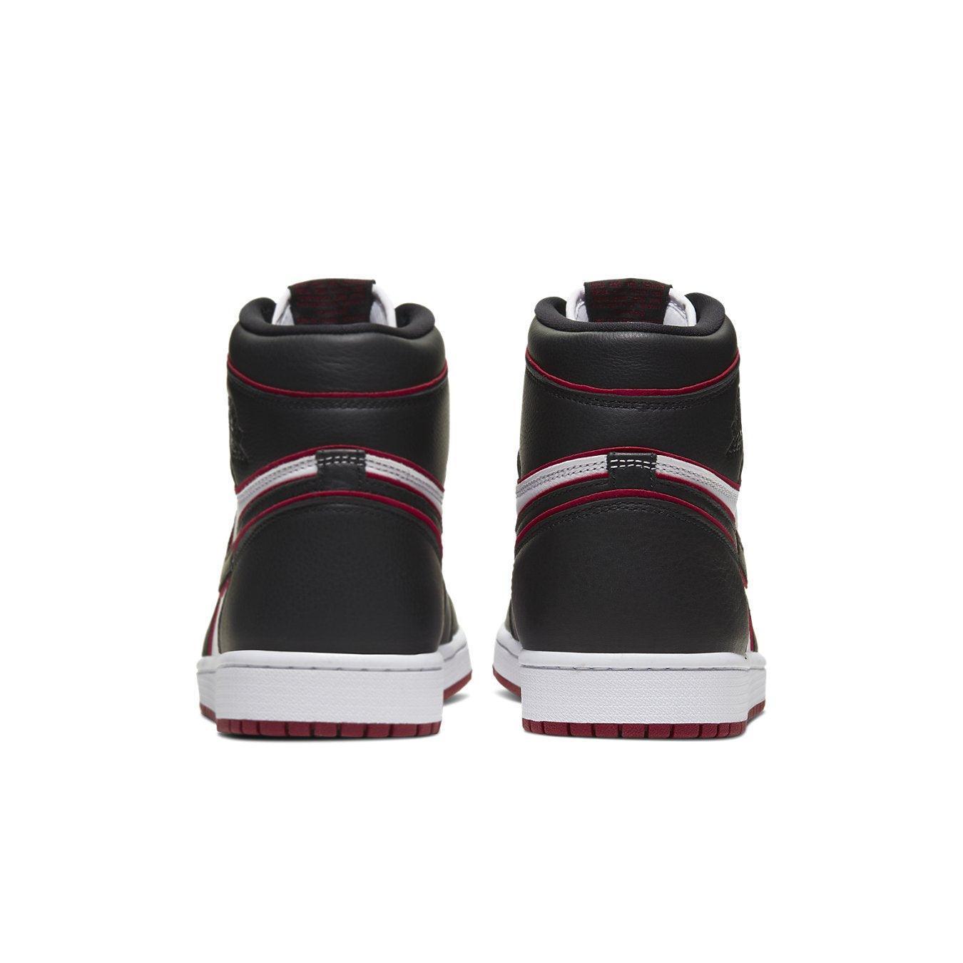 Retro Jordan 1 Bloodline black and red sneakers, showing the back view with iconic design elements.