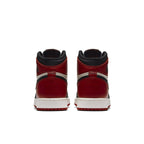 Back view of Jordan 1 Retro High Bred Toe sneakers showcasing red leather and black accents.