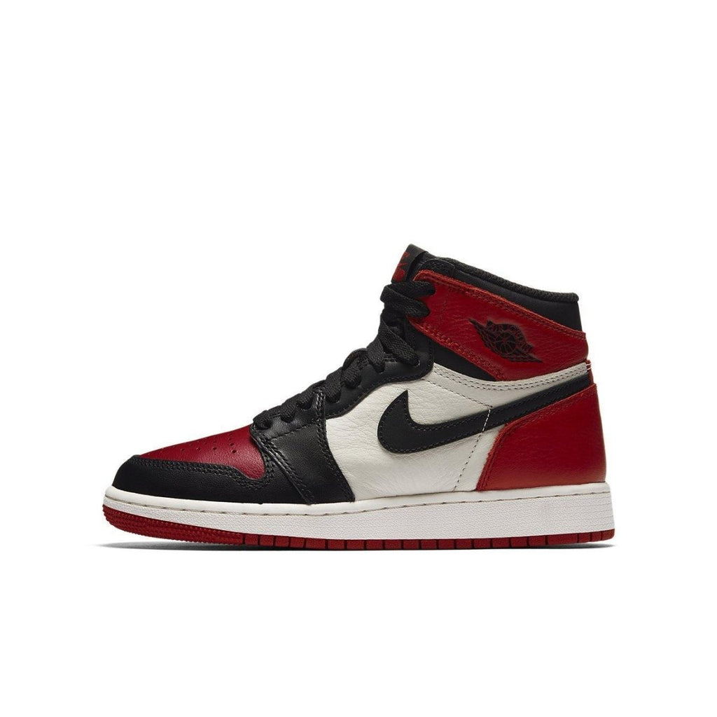 Jordan 1 Retro High Bred Toe (GS) featuring red, black, and white leather design with iconic Swoosh.