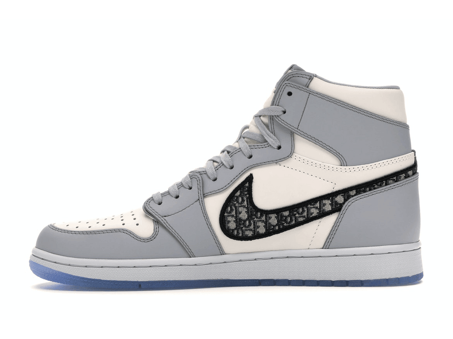 Jordan 1 Retro High Dior sneaker featuring a white and gray Italian leather design with a hand-painted Swoosh.