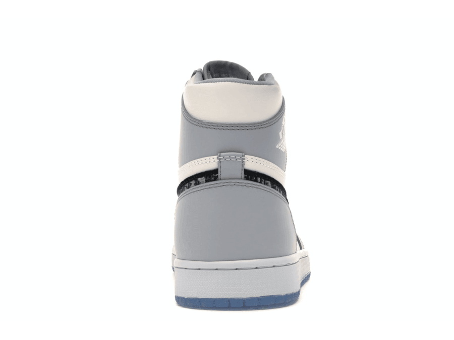 Back view of the Jordan 1 Retro High Dior featuring a gray and white leather design and iconic Air Jordan branding.
