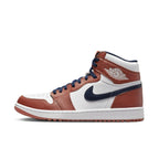 Nike Air Jordan 1 Retro High Golf Eastside Golf 'Out the Mud' in white, burnt sunrise, and midnight navy colorway.