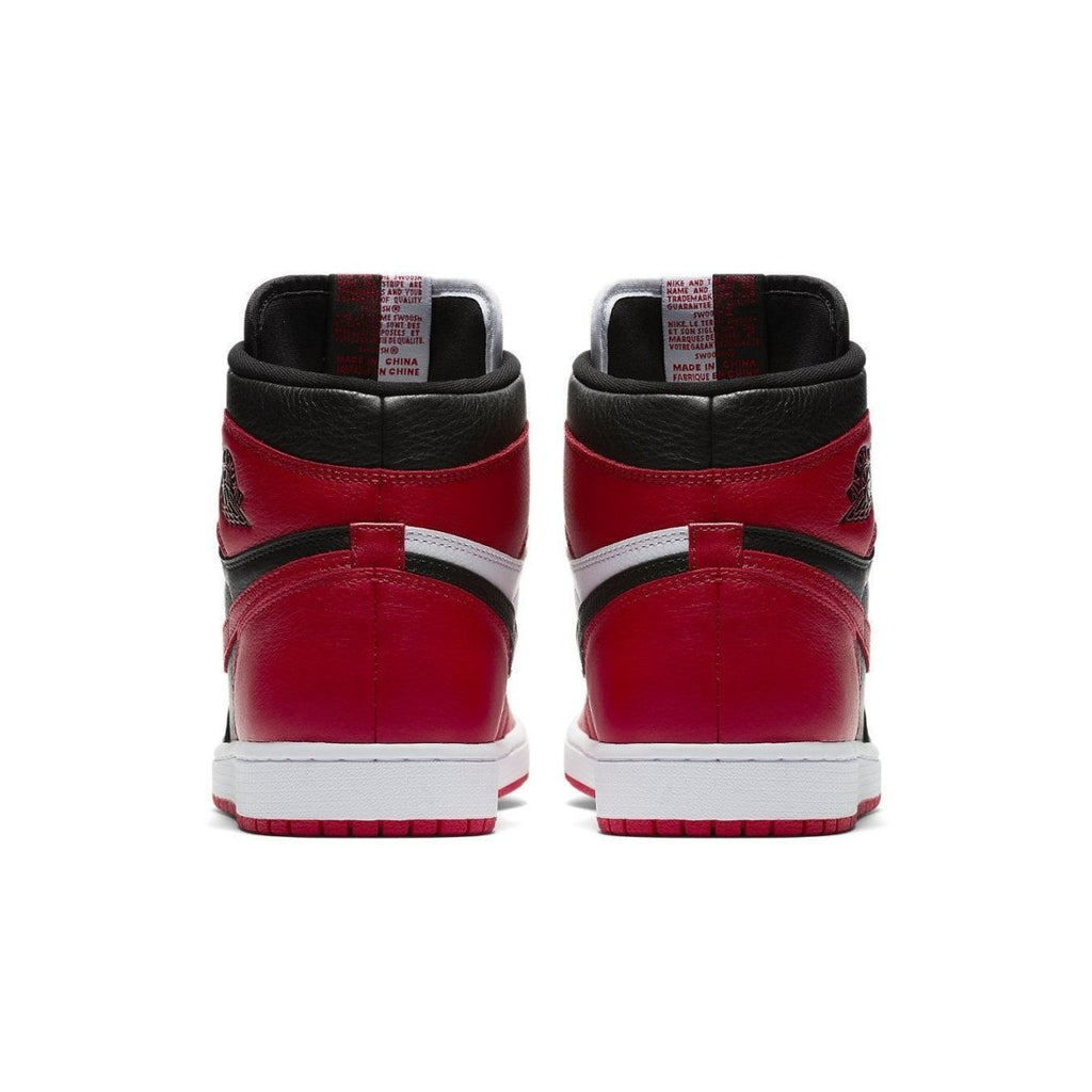 Back view of Air Jordan 1 Retro High Homage to Home in black and red, featuring vintage Chicago Bulls colors.